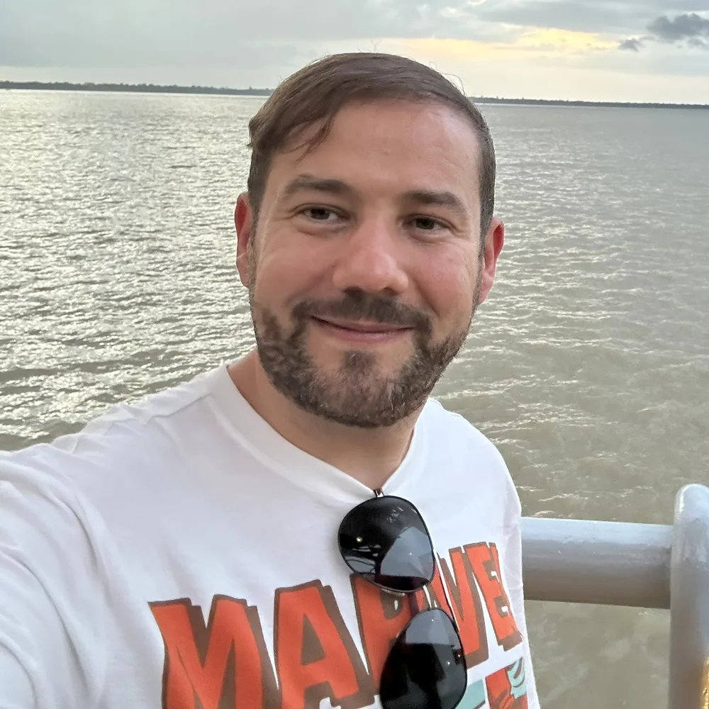 Arisson Santos beside the river in Belém